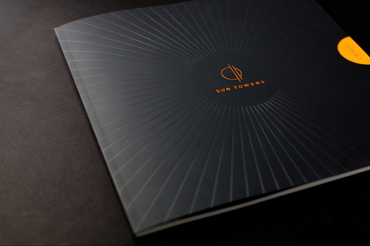 Close up shot of the cover of Sun Towers brochure