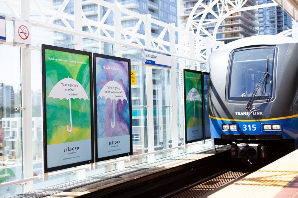 Local Vancouver skytrain station featuring Belford Properties improved marketing signage 