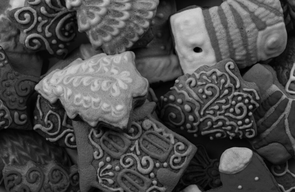 black and white shot of nicely decorated Christmas cookies