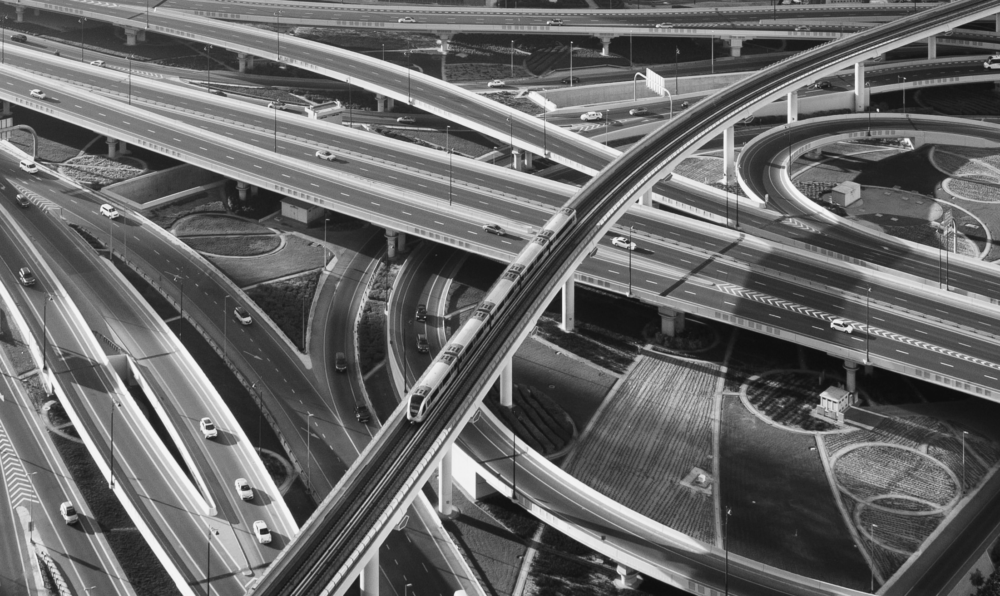 black and white image of busy overpass